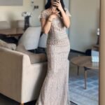 فستان سهرة أوف وايت مرصع بالخرز والترتر