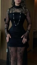 فستان سهرة أسود فاخر بقصة أنثوية جذابة وتفاصيل دانتيل