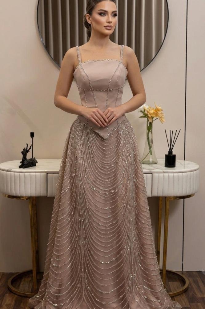 5f48bfff-d0be-48f4-a907-b09ef27ddb9c-666.66666666667x1000-DtwsvHrifbRIWS1WEL1HPGQehPsHR97gJLDtxVuV.jpg فستان سهرة نيود فاخر خرز وباربي - الصورة 1