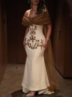 فستان سهرة فاخر بتطريز ذهبي مع شال درابيه أنيق