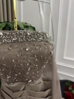 ⁦فستان سهرة شامبين فاخر بتصميم كورسيه أنيق⁩ - الصورة ⁦4⁩