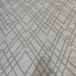 قماش تول "أبيض ثلجي" بتطريز هندسي كريستالي