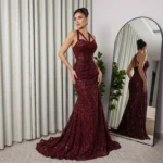 فستان سهرة خمري مرصع بالترتر