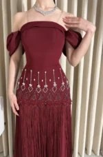 فستان سهرة خمري فاخر بتطريز كريستالي