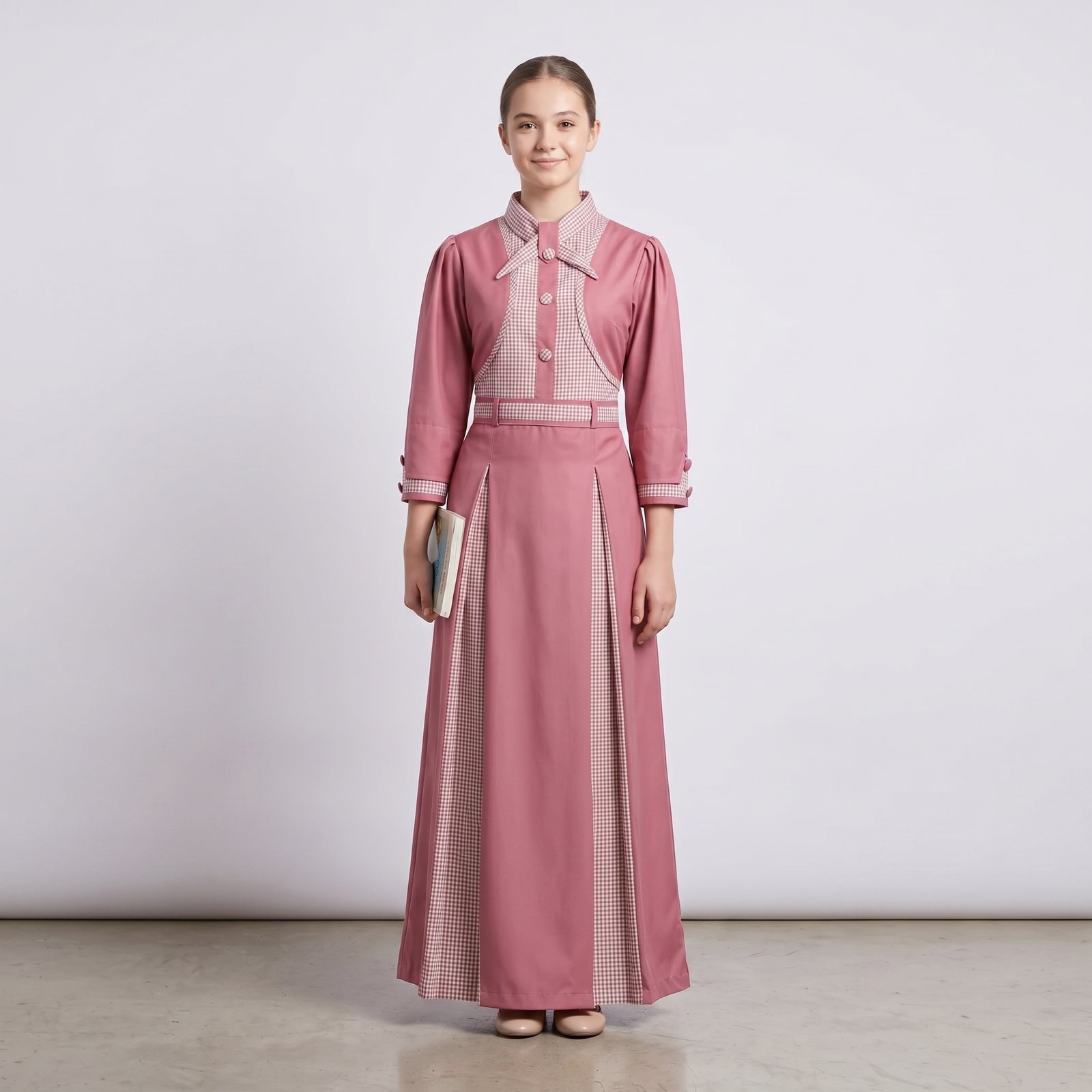 Apron_long_to_heel_2K_202607261339 مريول مدرسي كويتي وردي ابتدائي - الصورة 1